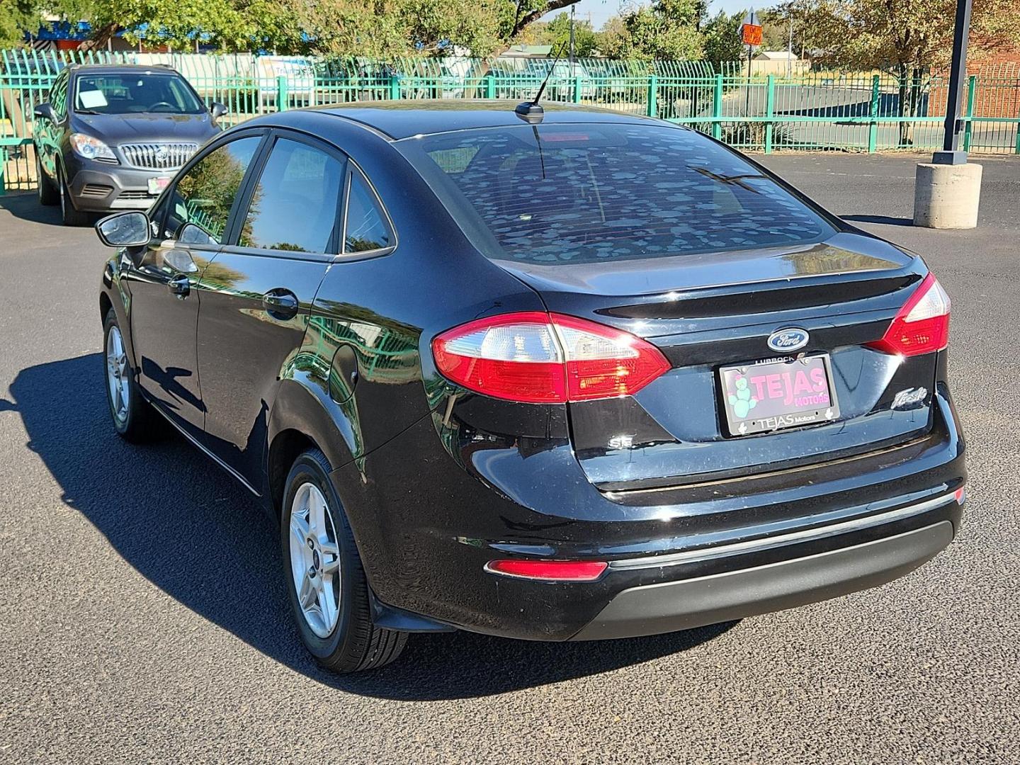 2018 Shadow Black - G1 /Charcoal Black - 1D Ford Fiesta SE (3FADP4BJ2JM) with an ENGINE: 1.6L TI-VCT I-4 engine, located at 4110 Avenue Q, Lubbock, 79412, 33.556553, -101.855820 - Photo#2