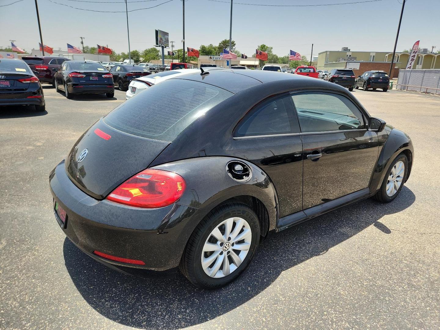 2014 Black Uni Volkswagen Beetle Coupe 1.8T Entry (3VWF17ATXEM) with an Engine: 1.8T 4 Cylinder 170 HP engine, located at 4110 Avenue Q, Lubbock, 79412, 33.556553, -101.855820 - 06/14/2024 KEY AND INSPECTION IN ENVELOPE GOD - Photo#1