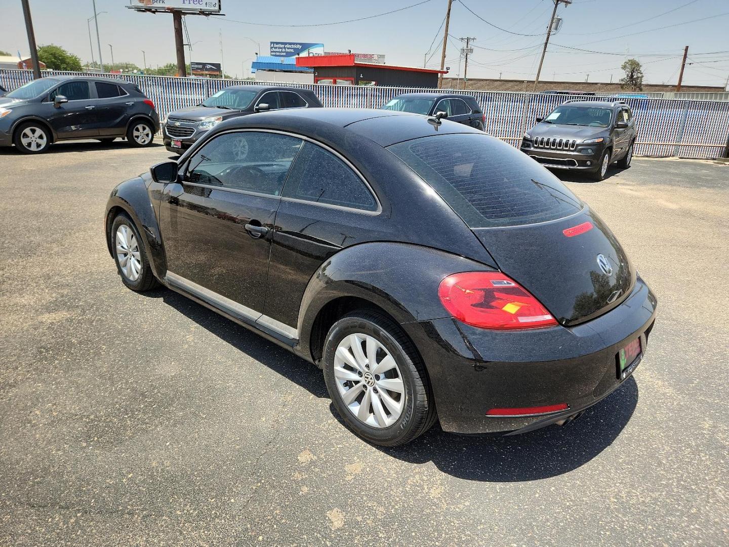 2014 Black Uni Volkswagen Beetle Coupe 1.8T Entry (3VWF17ATXEM) with an Engine: 1.8T 4 Cylinder 170 HP engine, located at 4110 Avenue Q, Lubbock, 79412, 33.556553, -101.855820 - 06/14/2024 KEY AND INSPECTION IN ENVELOPE GOD - Photo#2