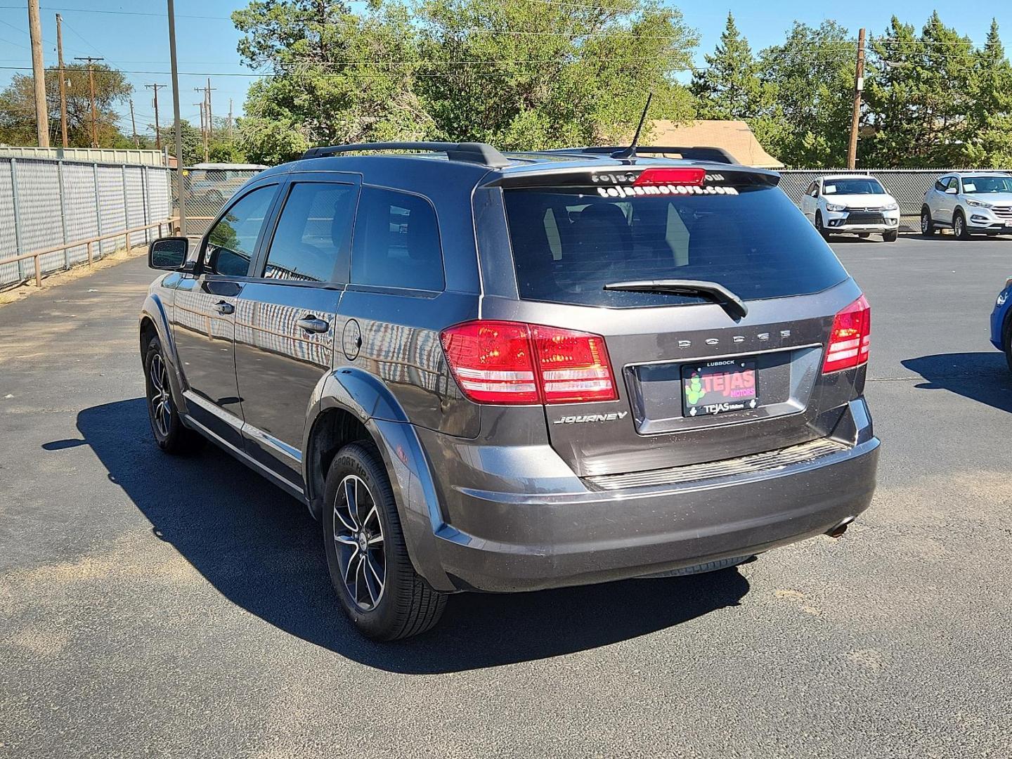 2018 Granite Pearlcoat - PAU /Black - E5X9 Dodge Journey SE (3C4PDCAB0JT) with an ENGINE: 2.4L I4 DOHC 16V DUAL VVT engine, located at 4110 Avenue Q, Lubbock, 79412, 33.556553, -101.855820 - Photo#2