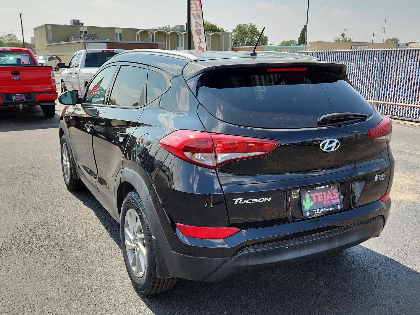 2016 Ash Black - TCM /Gray - TGG Hyundai Tucson SE (KM8J33A49GU) with an Engine: 2.0L DOHC 16V I4 w/CVVT MPI engine, located at 4110 Avenue Q, Lubbock, 79412, 33.556553, -101.855820 - 08/01/2024 KEY AND INSPECTION IN ENVELOPE GOD - Photo#2