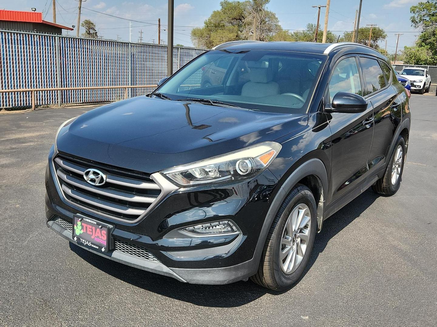 2016 Ash Black - TCM /Gray - TGG Hyundai Tucson SE (KM8J33A49GU) with an Engine: 2.0L DOHC 16V I4 w/CVVT MPI engine, located at 4110 Avenue Q, Lubbock, 79412, 33.556553, -101.855820 - 08/01/2024 KEY AND INSPECTION IN ENVELOPE GOD - Photo#3