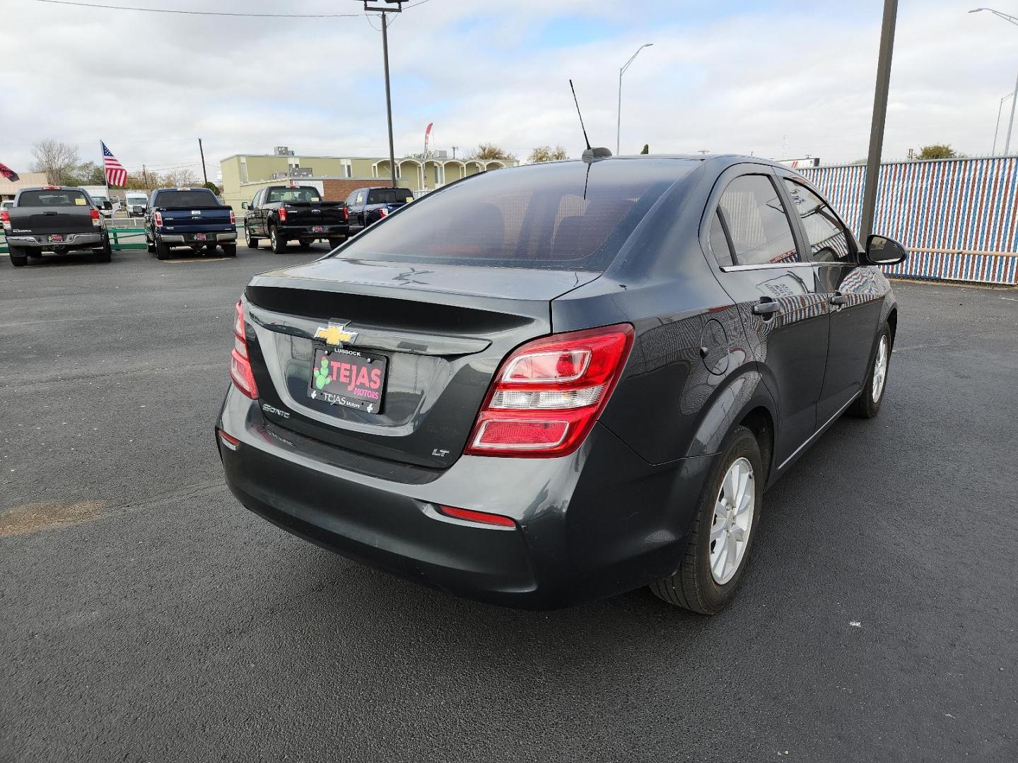 2018 Grey /Grey Chevrolet Sonic LT (1G1JD5SH7J4) with an ENGINE, ECOTEC 1.8L VARIABLE VALVE TIMING DOHC 4-CYLINDER SEQUENTIAL MFI engine, located at 4110 Avenue Q, Lubbock, 79412, 33.556553, -101.855820 - Photo#2