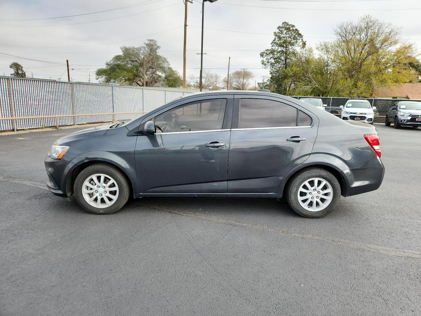 2018 Grey /Grey Chevrolet Sonic LT (1G1JD5SH7J4) with an ENGINE, ECOTEC 1.8L VARIABLE VALVE TIMING DOHC 4-CYLINDER SEQUENTIAL MFI engine, located at 4110 Avenue Q, Lubbock, 79412, 33.556553, -101.855820 - Photo#4