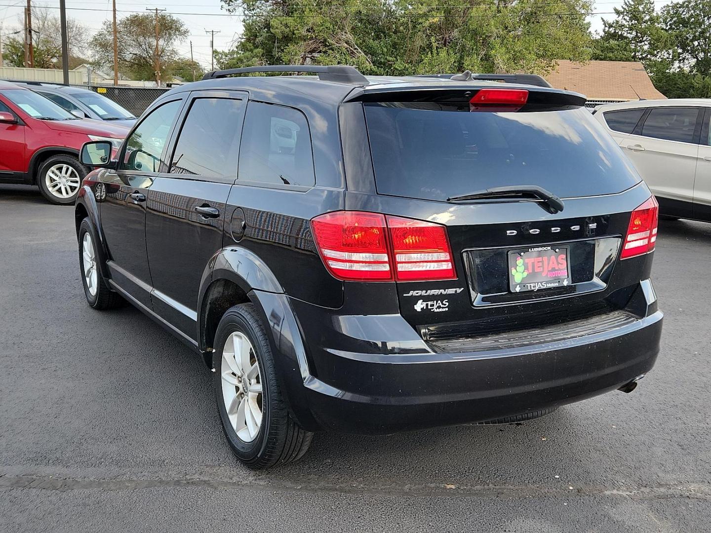 2018 Pitch Black Clearcoat - PX8 /Black - E5X9 Dodge Journey SE (3C4PDCAB9JT) with an ENGINE: 2.4L I4 DOHC 16V DUAL VVT engine, located at 4110 Avenue Q, Lubbock, 79412, 33.556553, -101.855820 - Photo#2