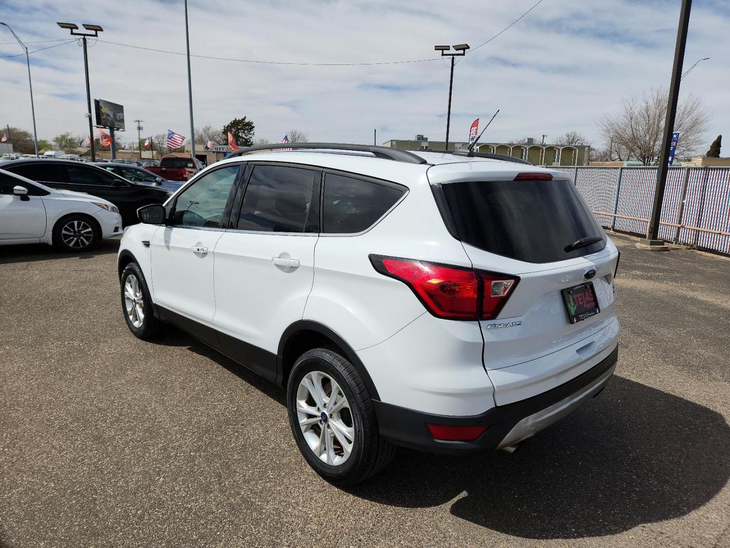 2019 WHITE Ford Escape SEL (1FMCU0HD4KU) with an ENGINE: 1.5L ECOBOOST engine, located at 4110 Avenue Q, Lubbock, 79412, 33.556553, -101.855820 - 03/01/2024 INSPECTION AND KEY IN ENVELOPE GOD - Photo#2