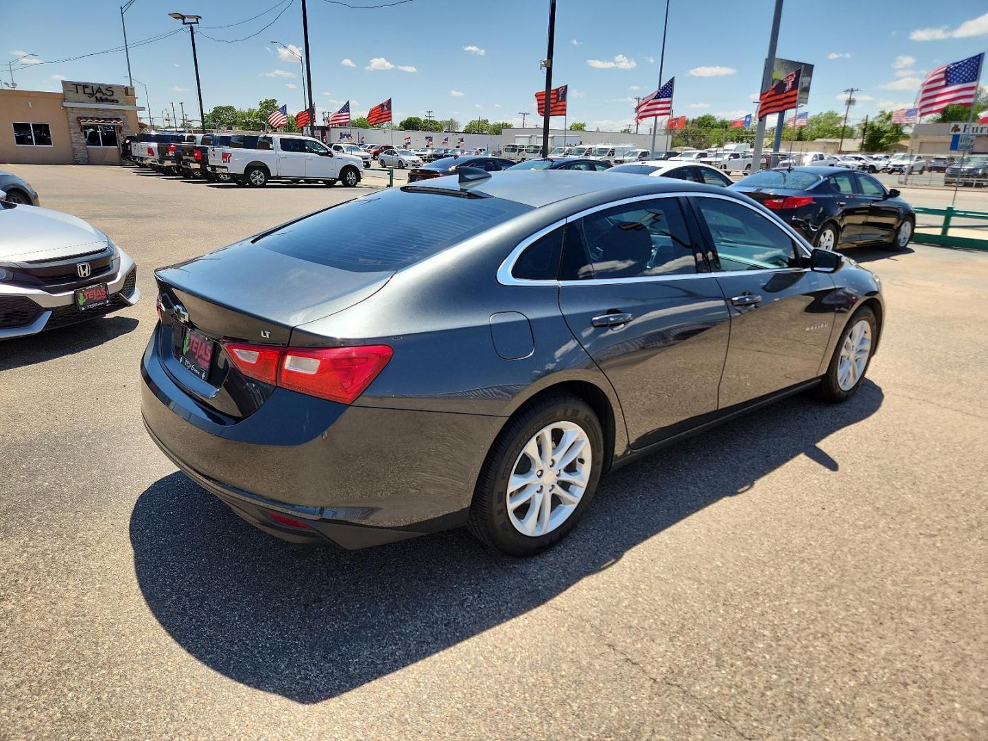 2017 GRAY Chevrolet Malibu LT (1G1ZE5ST1HF) with an ENGINE, 1.5L TURBO DOHC 4-CYLINDER DI engine, located at 4110 Avenue Q, Lubbock, 79412, 33.556553, -101.855820 - Photo#1