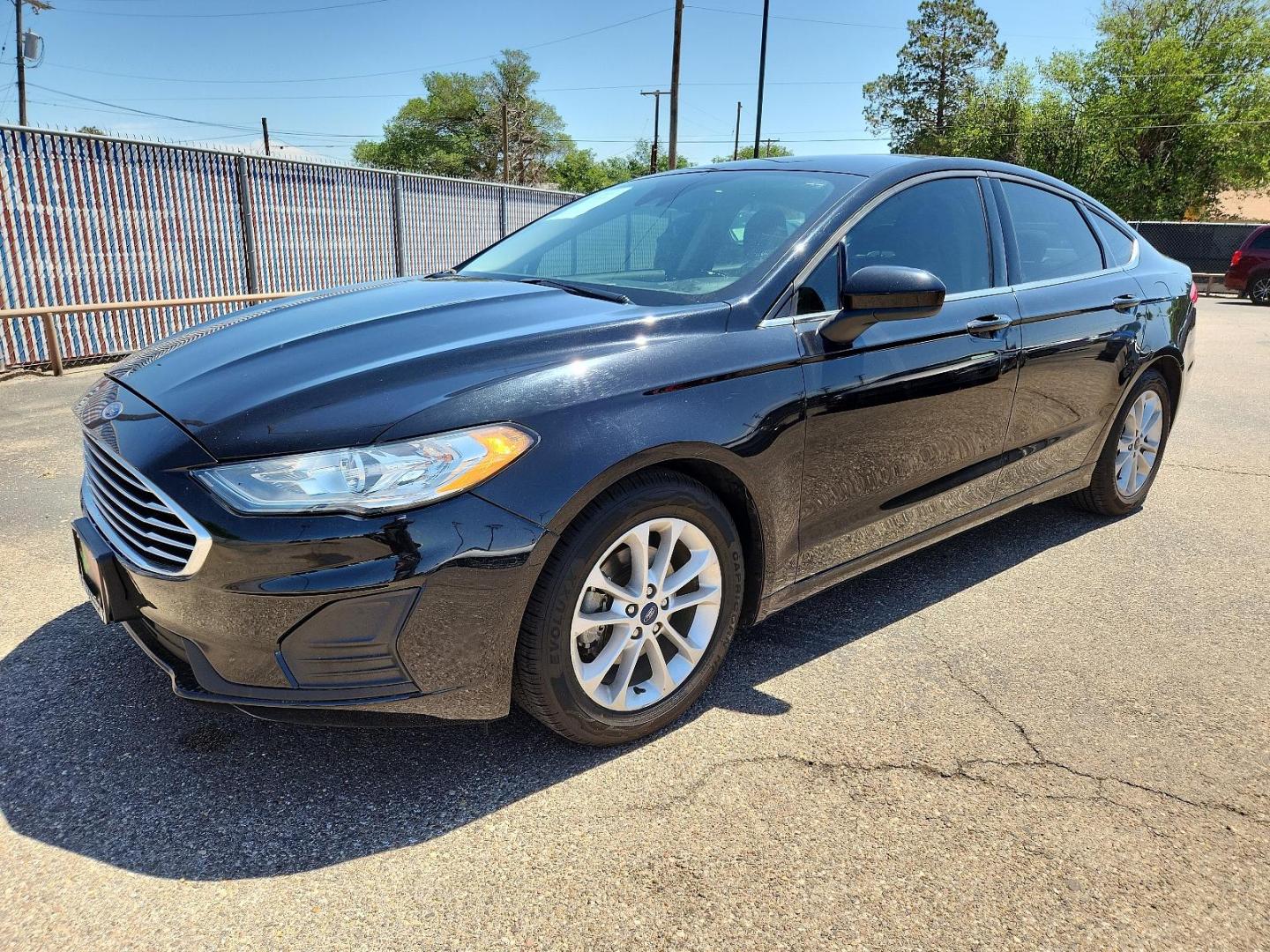 2019 BLACK /Black Ford Fusion SE (3FA6P0HD2KR) with an ENGINE: 1.5L ECOBOOST engine, located at 4110 Avenue Q, Lubbock, 79412, 33.556553, -101.855820 - Photo#1