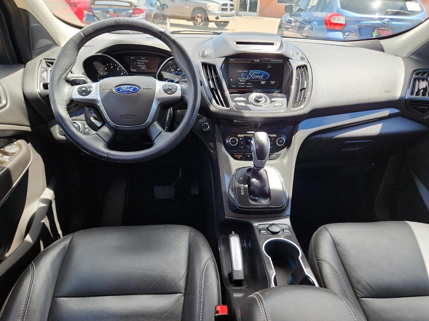 2015 BLACK Ford Escape Titanium (1FMCU9JX2FU) with an ENGINE: 1.6L ECOBOOST engine, located at 4110 Avenue Q, Lubbock, 79412, 33.556553, -101.855820 - 05/24/2024 KEY IN ENVELOPE GOD - Photo#5