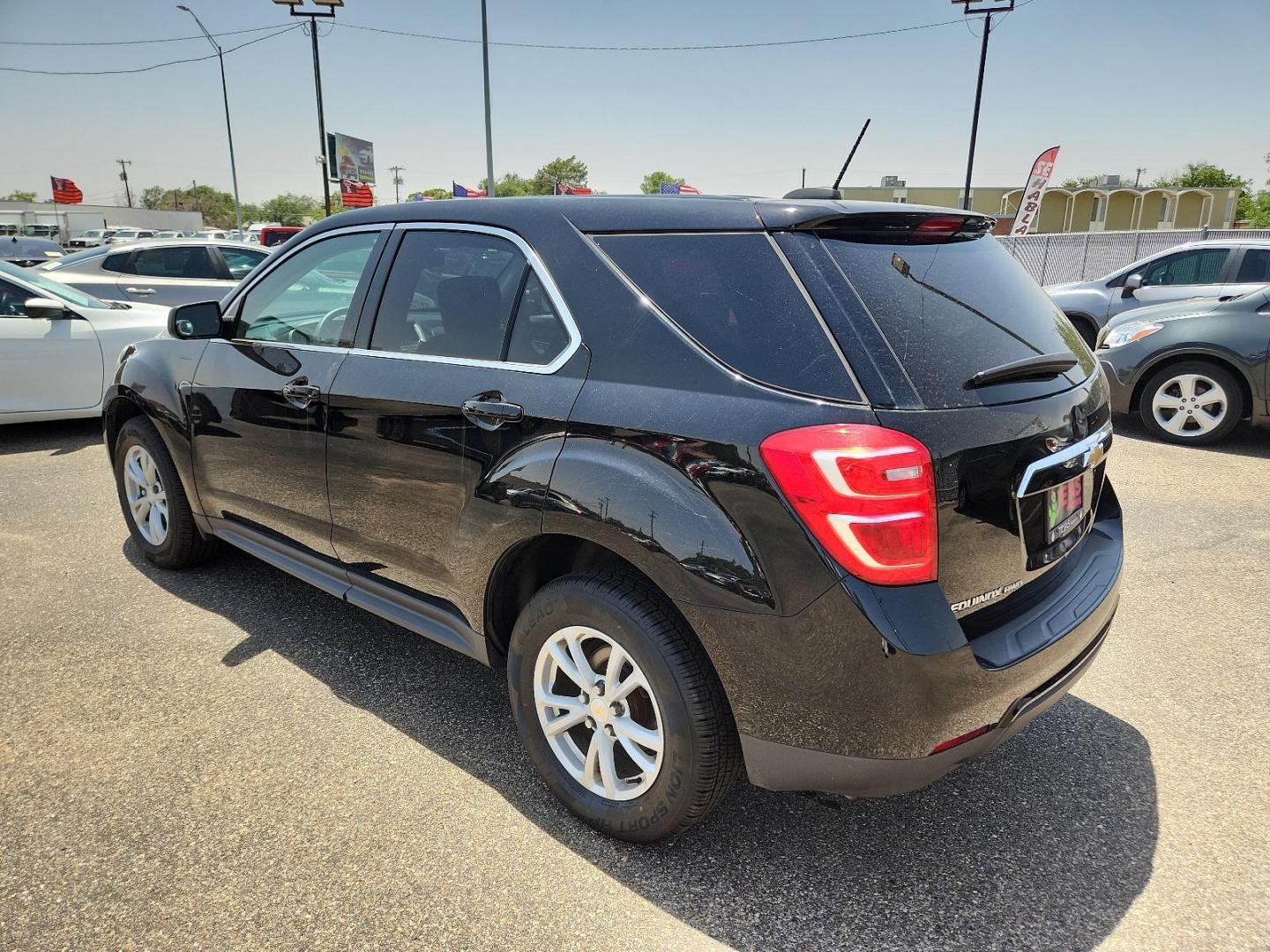 2017 Black Chevrolet Equinox LS (2GNFLEEKXH6) with an ENGINE, 2.4L DOHC 4-CYLINDER SIDI (SPARK IGNITION DIRECT INJECTION) engine, located at 4110 Avenue Q, Lubbock, 79412, 33.556553, -101.855820 - INSPECTION IN ENVELOPE GOD 06/13/2024 KEY IN ENVELOPE GOD - Photo#2