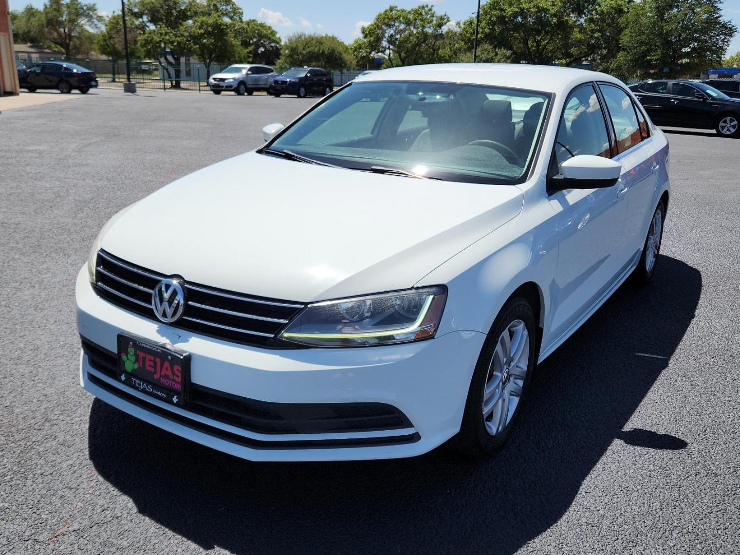 2017 Pure White Volkswagen Jetta 1.4T S (3VW2B7AJXHM) with an Engine: 1.4L TSI I-4 Turbocharged -inc: DOHC 16-valve, direct injection engine, located at 4110 Avenue Q, Lubbock, 79412, 33.556553, -101.855820 - 06/29/2024 INSPECTION IN ENVELOPE GOD 08/28/2024 key in envelope god - Photo#3