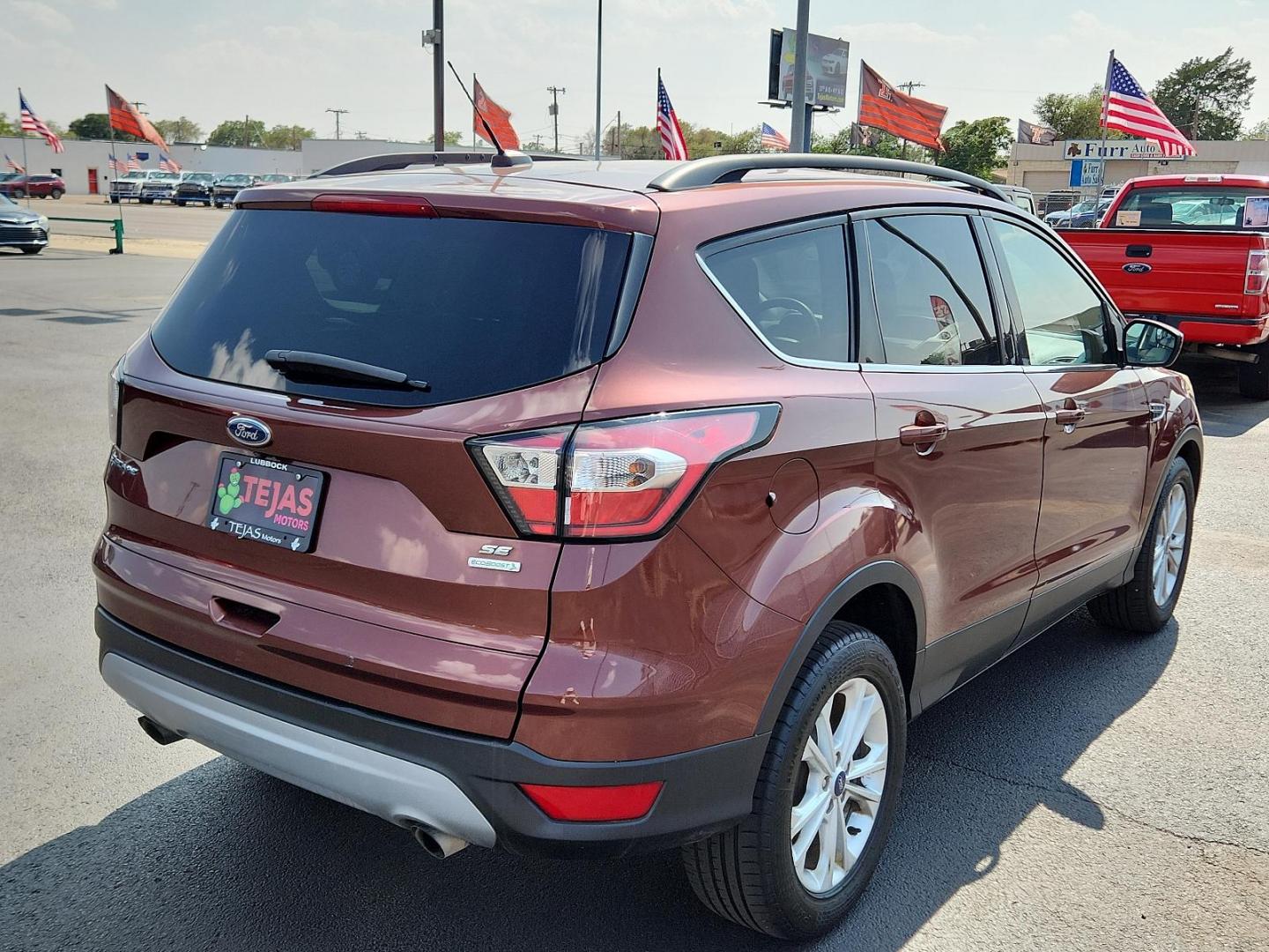 2018 RED Ford Escape SE (1FMCU0GD8JU) with an ENGINE: 1.5L ECOBOOST engine, located at 4110 Avenue Q, Lubbock, 79412, 33.556553, -101.855820 - 07/09/2024 KEY IN ENVELOPE GOD 07/13/2024 INSPECTION IN ENVELOPE GOD - Photo#1