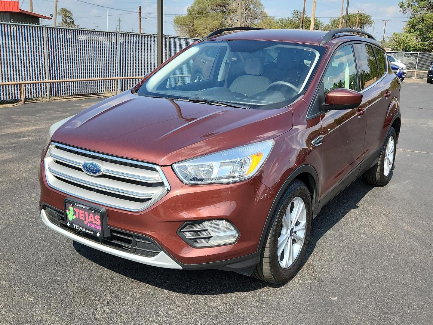 2018 RED Ford Escape SE (1FMCU0GD8JU) with an ENGINE: 1.5L ECOBOOST engine, located at 4110 Avenue Q, Lubbock, 79412, 33.556553, -101.855820 - 07/09/2024 KEY IN ENVELOPE GOD 07/13/2024 INSPECTION IN ENVELOPE GOD - Photo#3