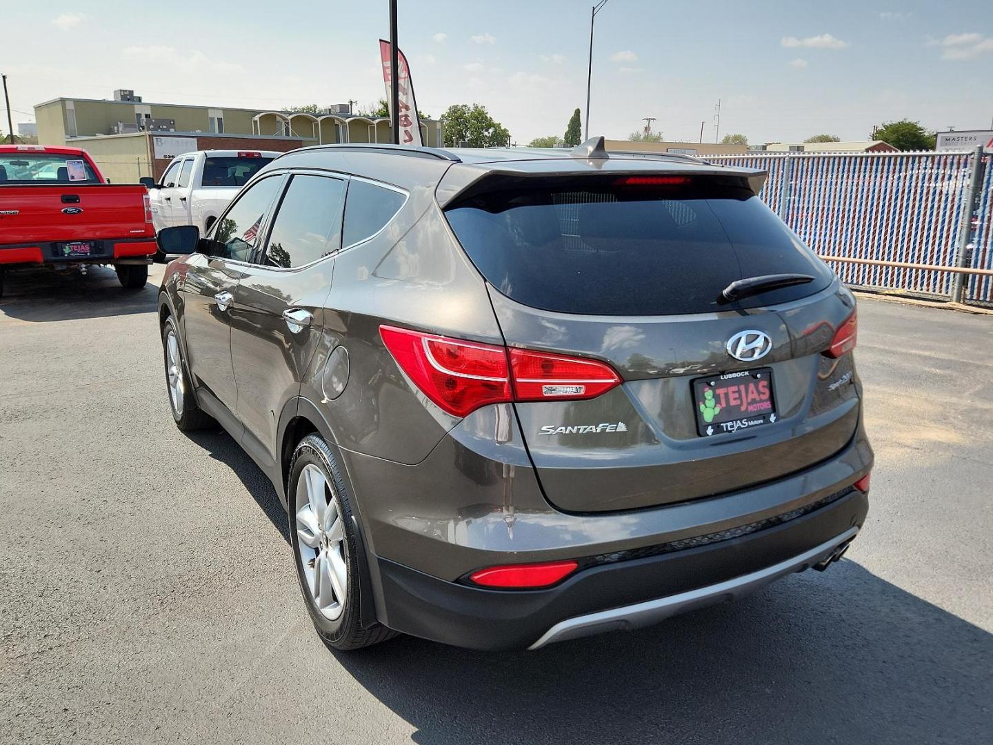 2014 Cabo Bronze - D0 /Beige - VYN Hyundai Santa Fe Sport Sport 2.0T FWD (5XYZU3LA1EG) with an Engine: 2.0L Turbo-GDI DOHC 16-Valve I4 engine, located at 4110 Avenue Q, Lubbock, 79412, 33.556553, -101.855820 - 07/30/2024 INSPECTION IN ENVELOPE GOD 08/02/2024 KEY IN ENVELOPE GOD - Photo#2