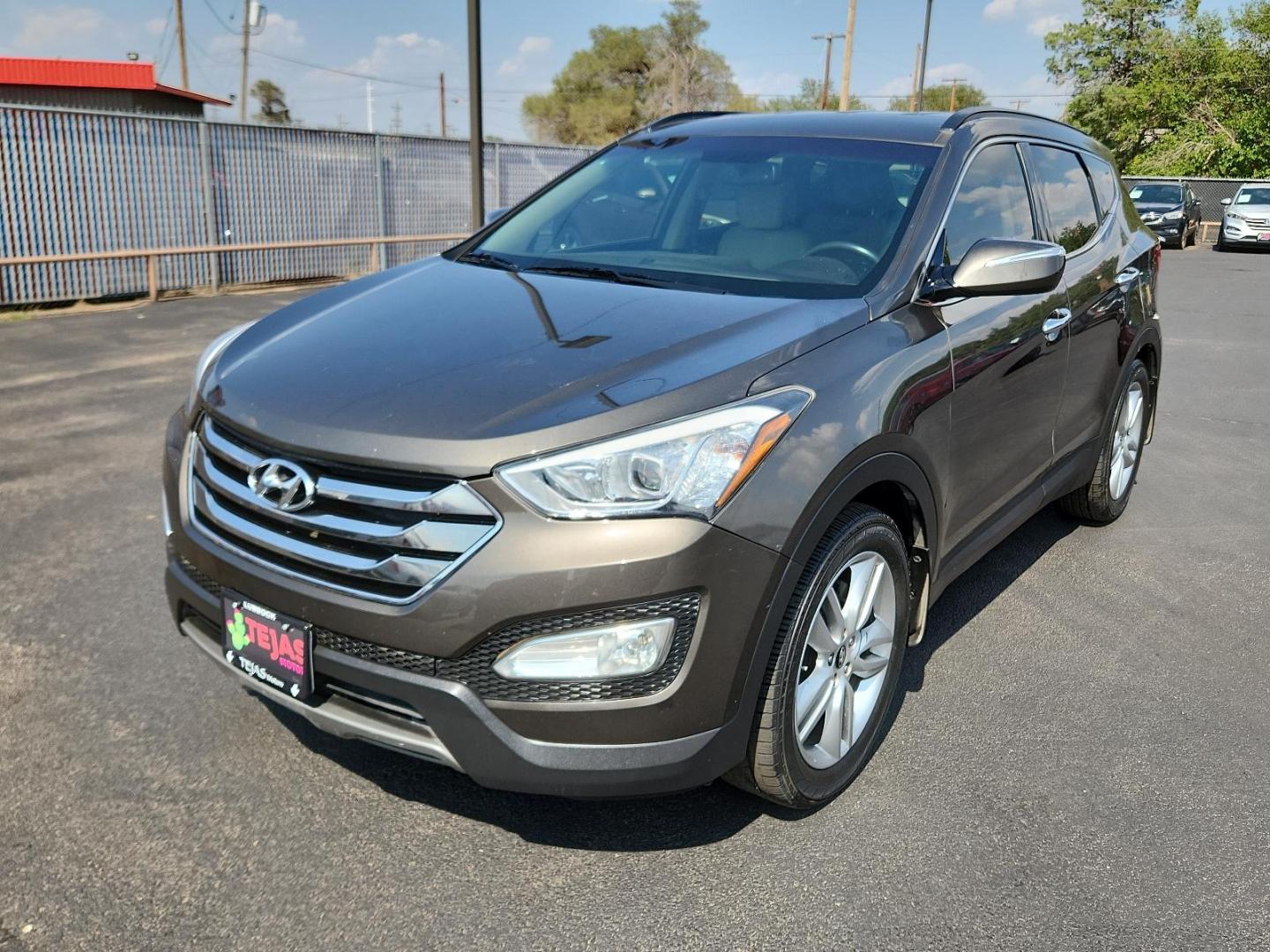 2014 Cabo Bronze - D0 /Beige - VYN Hyundai Santa Fe Sport Sport 2.0T FWD (5XYZU3LA1EG) with an Engine: 2.0L Turbo-GDI DOHC 16-Valve I4 engine, located at 4110 Avenue Q, Lubbock, 79412, 33.556553, -101.855820 - 07/30/2024 INSPECTION IN ENVELOPE GOD 08/02/2024 KEY IN ENVELOPE GOD - Photo#3