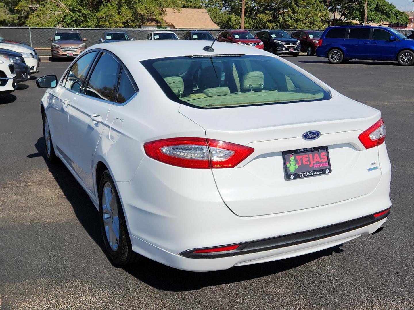 2014 Oxford White Ford Fusion SE (3FA6P0HDXER) with an ENGINE: 1.5L ECOBOOST engine, located at 4110 Avenue Q, Lubbock, 79412, 33.556553, -101.855820 - KEY IN ENVEN 08/09/2024 INSPECTION IN ENVELOPE GOD - Photo#2