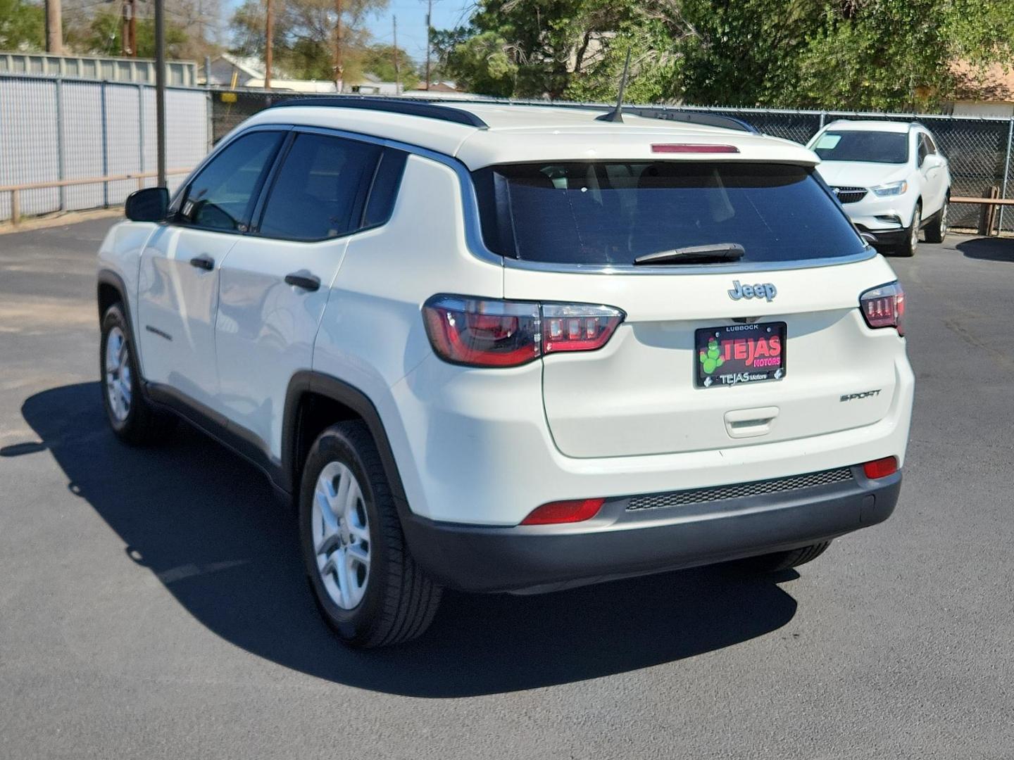 2019 WHITE Jeep Compass Sport (3C4NJCABXKT) with an ENGINE: 2.4L I4 ZERO EVAP M-AIR W/ESS engine, located at 4110 Avenue Q, Lubbock, 79412, 33.556553, -101.855820 - 09/19/2024 NSPECTION IN ENVELOPE GOD - Photo#2