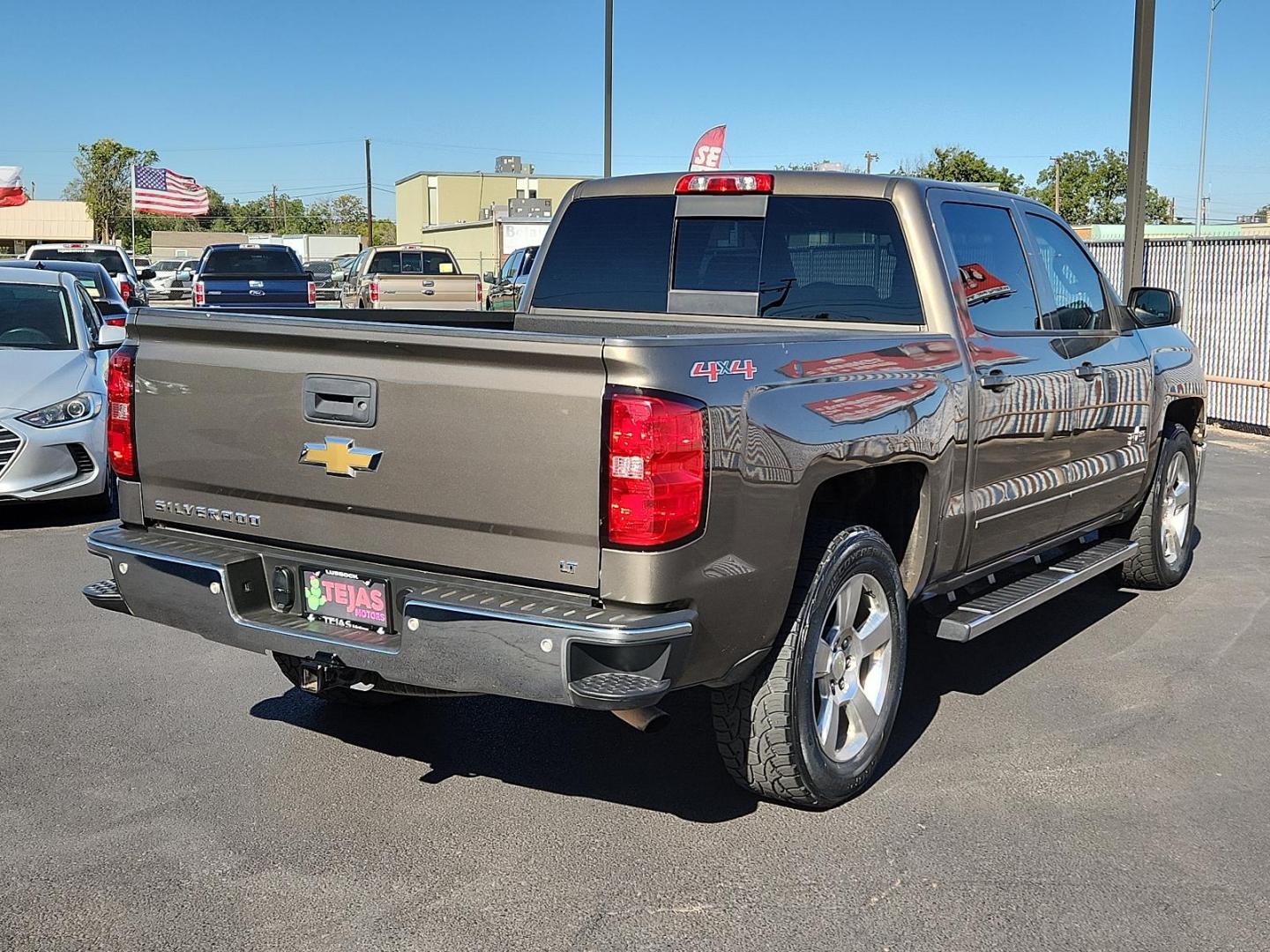 2015 Brownstone Metallic - GWX /Cocoa/Dune - H2T Chevrolet Silverado 1500 LT (3GCUKREC7FG) with an ENGINE, 5.3L ECOTEC3 V8 WITH ACTIVE FUEL MANAGEMENT, DIRECT INJECTION AND VARIABLE VALVE TIMING engine, located at 4110 Avenue Q, Lubbock, 79412, 33.556553, -101.855820 - 10/08/2024 DUPLICATE TRANSPONDER - Photo#1