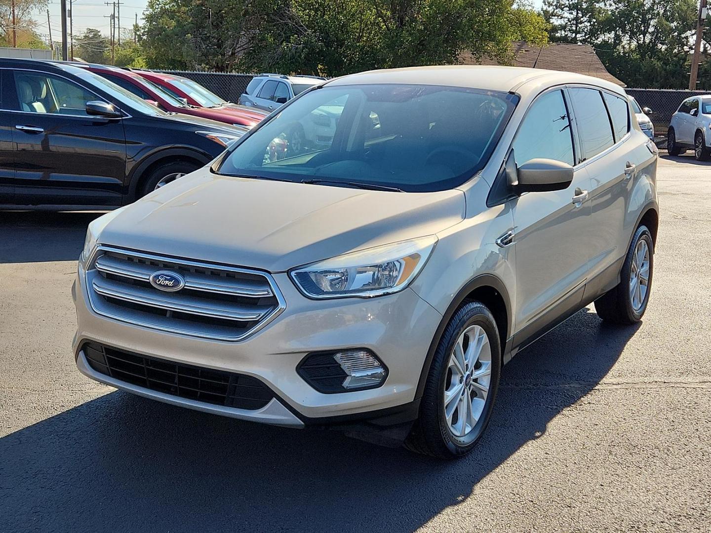 2017 GOLD Ford Escape SE (1FMCU0GD2HU) with an ENGINE: 1.5L ECOBOOST engine, located at 4110 Avenue Q, Lubbock, 79412, 33.556553, -101.855820 - 10/04/2024INSPECTION IN ENVELOPE GOD 10/08/2024 KEY IN ENVELOPE GOD - Photo#3