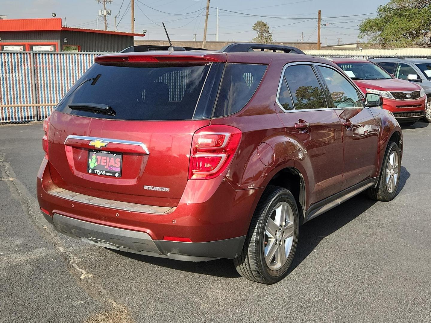 2016 RED Chevrolet Equinox LT (2GNALCEK8G1) with an ENGINE, 2.4L DOHC 4-CYLINDER SIDI (SPARK IGNITION DIRECT INJECTION) engine, located at 4110 Avenue Q, Lubbock, 79412, 33.556553, -101.855820 - 10/08/2024 KEY IN ENVELOPE GOD - Photo#1