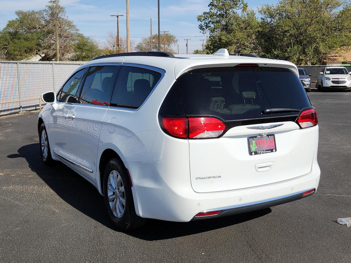 2017 Bright White Clear Coat Chrysler Pacifica Touring-L (2C4RC1BG5HR) with an 3.6L V6 DOHC 24V engine, located at 4110 Avenue Q, Lubbock, 79412, 33.556553, -101.855820 - Photo#2