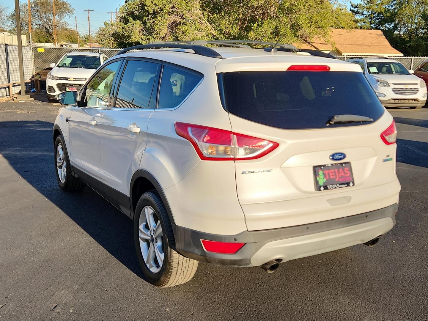 2016 WHITE Ford Escape SE (1FMCU0G99GU) with an ENGINE: 2.0L ECOBOOST engine, located at 4110 Avenue Q, Lubbock, 79412, 33.556553, -101.855820 - 11/06/2024 KEY IN ENVELOPE GOD 11/07/2024 INSPECTION IN EVELOPE GOD - Photo#2