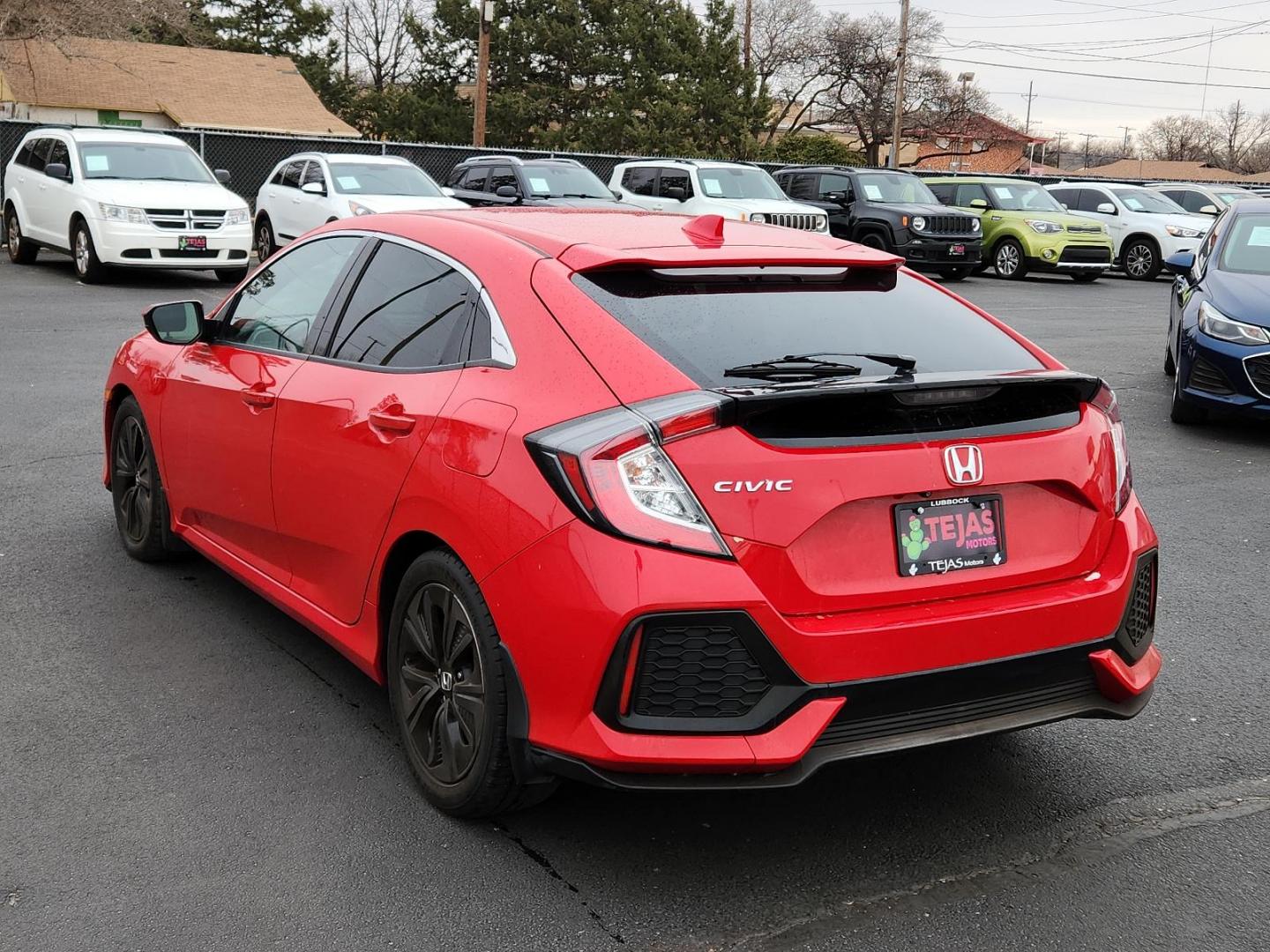 2018 RED Honda Civic Hatchback EX (SHHFK7H56JU) with an Engine: 1.5L I-4 DOHC 16-Valve Turbocharged engine, located at 4110 Avenue Q, Lubbock, 79412, 33.556553, -101.855820 - Photo#2