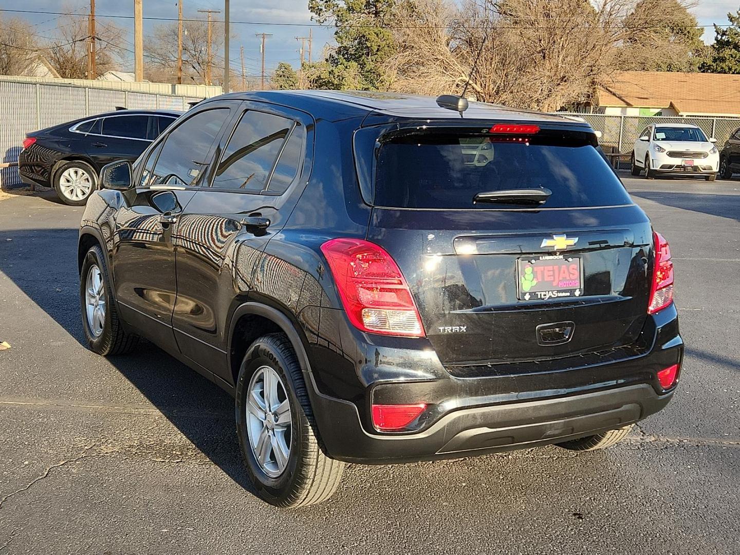 2021 BLACK Chevrolet Trax LS (KL7CJKSB0MB) with an ENGINE, ECOTEC TURBO 1.4L VARIABLE VALVE TIMING DOHC 4-CYLINDER SEQUENTIAL MFI engine, located at 4110 Avenue Q, Lubbock, 79412, 33.556553, -101.855820 - Photo#2