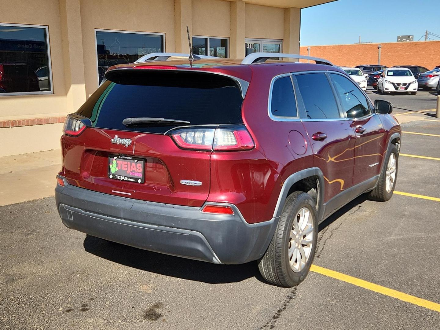 2019 RED Jeep Cherokee Latitude (1C4PJLCB7KD) with an ENGINE: 2.4L I4 ZERO EVAP M-AIR W/ESS engine, located at 4110 Avenue Q, Lubbock, 79412, 33.556553, -101.855820 - 01/29/2025 KEY INENVELOPE GOD - Photo#1