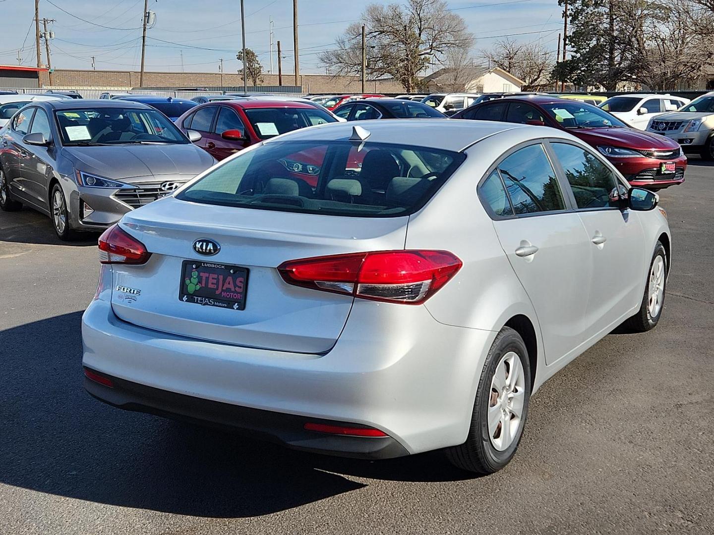 2017 SILVER Kia Forte LX (3KPFK4A74HE) with an Engine: 2.0L I4 DOHC D-CVVT MPI engine, located at 4110 Avenue Q, Lubbock, 79412, 33.556553, -101.855820 - 01/31/2025 key in envelope god - Photo#1