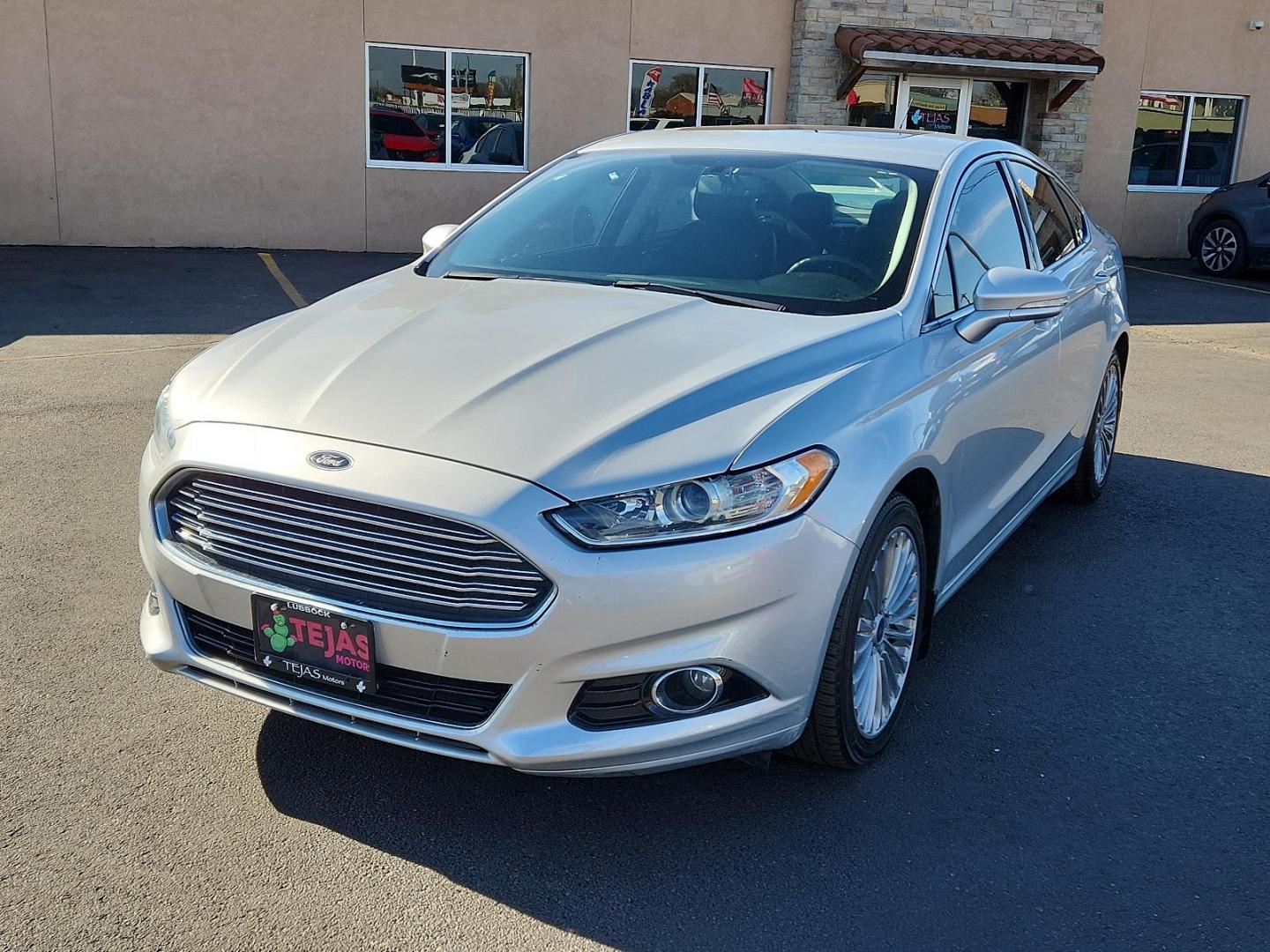 2016 Silver Ford Fusion Titanium (3FA6P0K93GR) with an ENGINE: 2.0L ECOBOOST engine, located at 4110 Avenue Q, Lubbock, 79412, 33.556553, -101.855820 - 02/05/2025 KEY IN ENVELOPE GOD - Photo#3