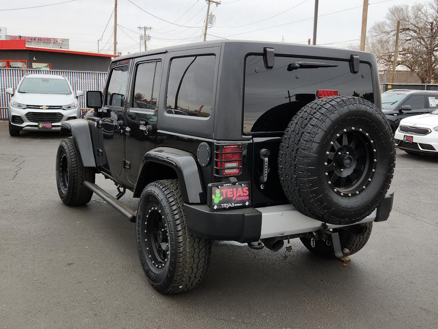 2014 BLACK Jeep Wrangler Unlimited Sahara (1C4HJWEG2EL) with an ENGINE: 3.6L V6 VVT engine, located at 4110 Avenue Q, Lubbock, 79412, 33.556553, -101.855820 - 01/15/2025KEY IN ENVELOPE GOD - Photo#2